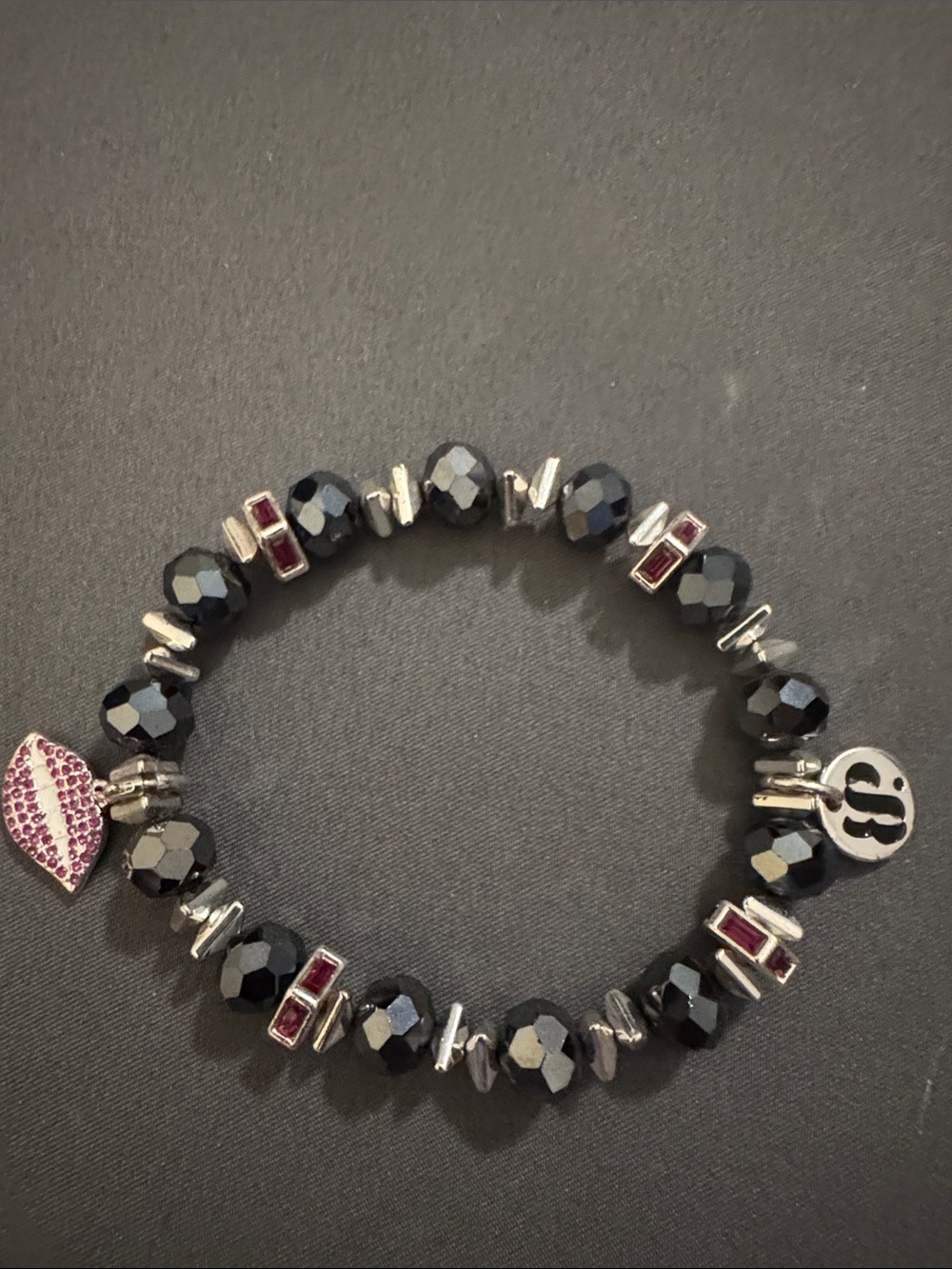 Bomb Party Black Faceted Bead Stretch Bracelet with Pink Crystal Lip Charm